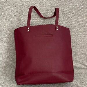 Sophisticated Red Tote Bag with Silver Hardware